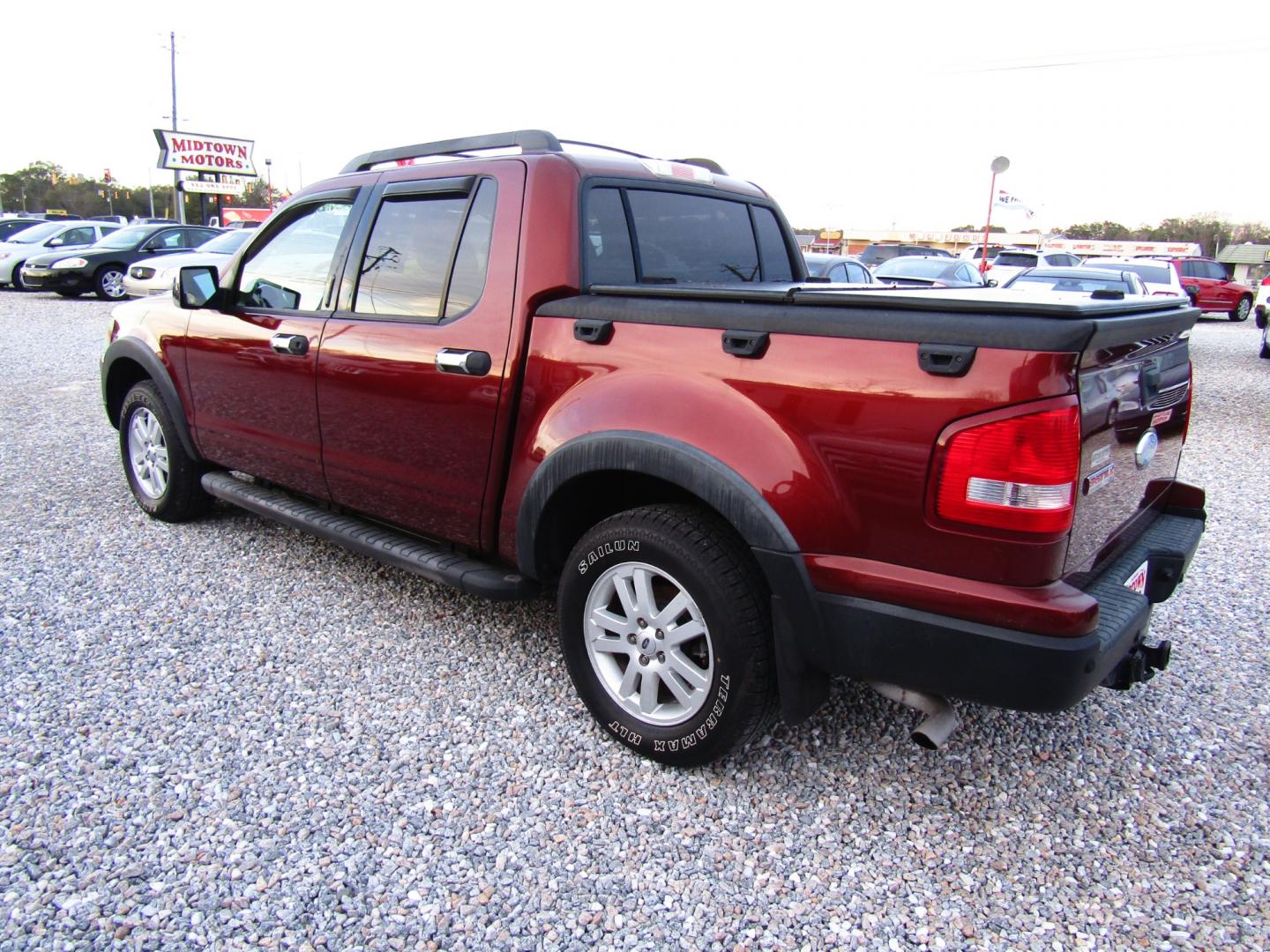 2010 Bronze /Tan Ford Explorer Sport Trac XLT 4.0L 2WD (1FMEU3BE3AU) with an 4.0L V6 SOHC 12V engine, Automatic transmission, located at 15016 S Hwy 231, Midland City, AL, 36350, (334) 983-3001, 31.306210, -85.495277 - Photo#5